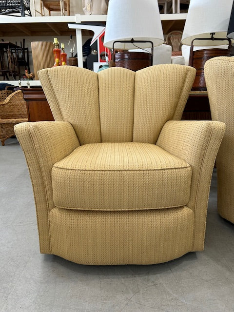 pair scalloped swivel chairs