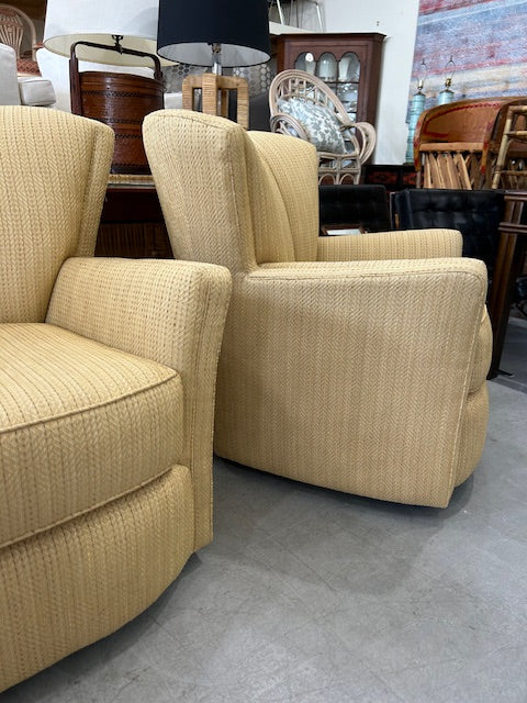pair scalloped swivel chairs