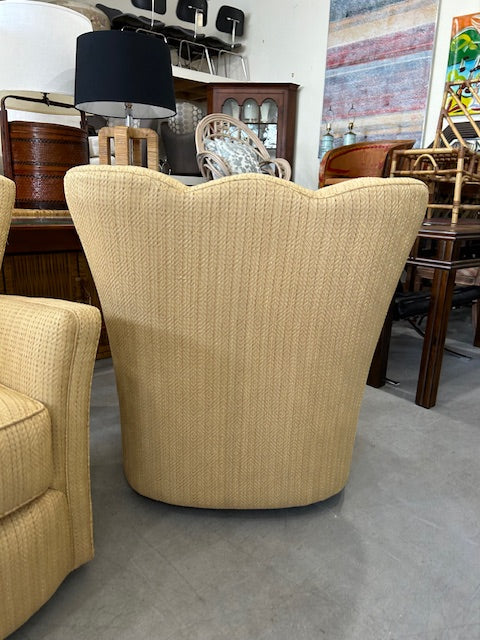 pair scalloped swivel chairs